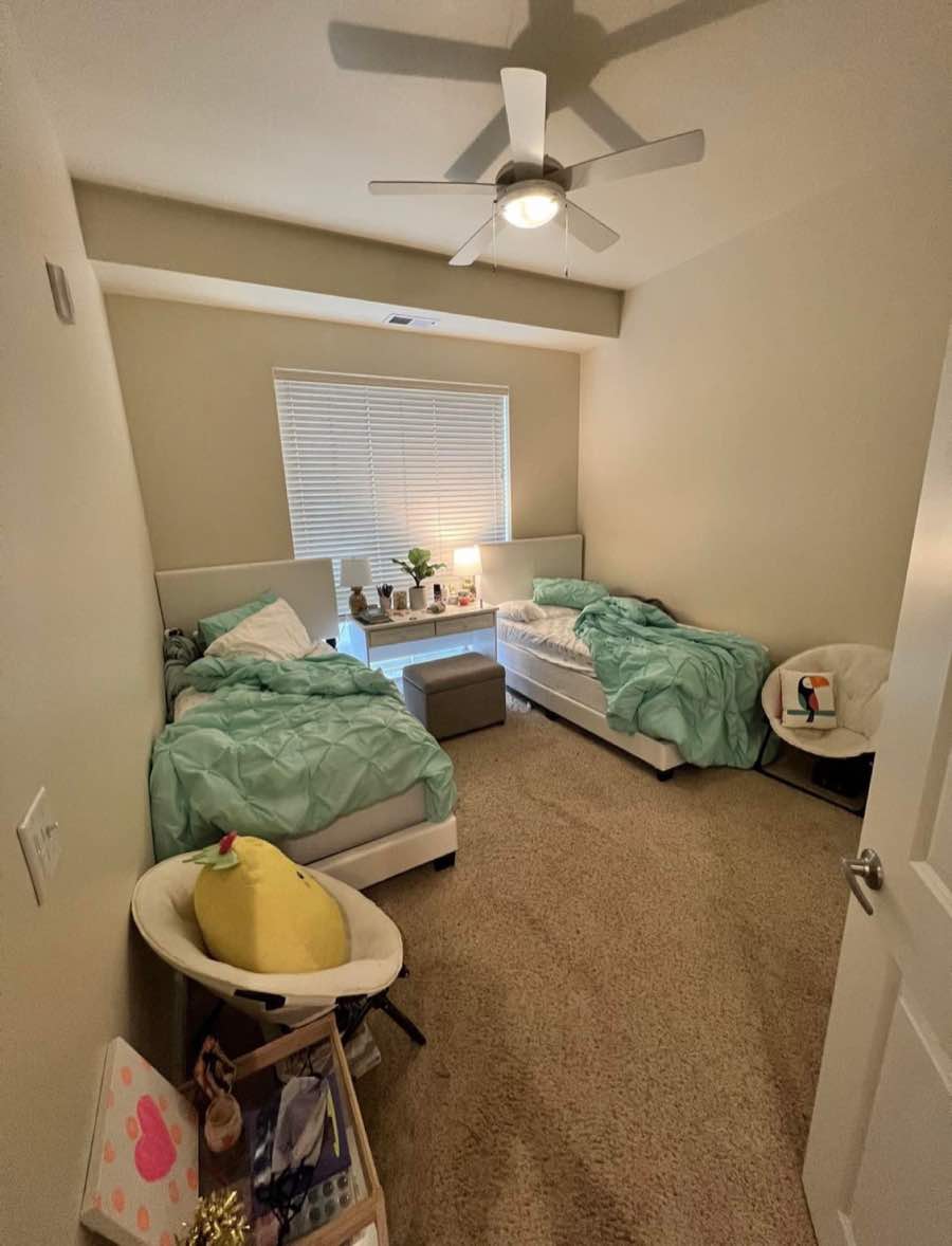 Twin bedroom before cleaning