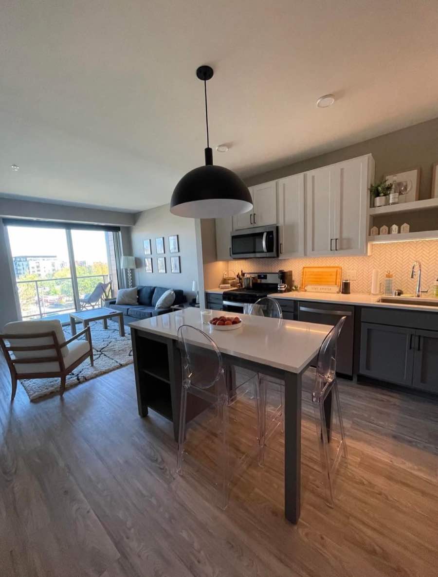 Kitchen with white cabinets and island