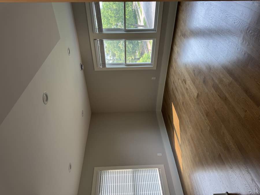 Sunlit room with wood floors