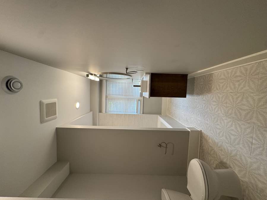Bright bathroom with vanity and window